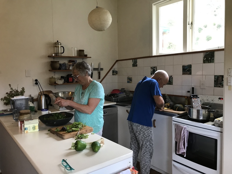 Preparing food in kitchen