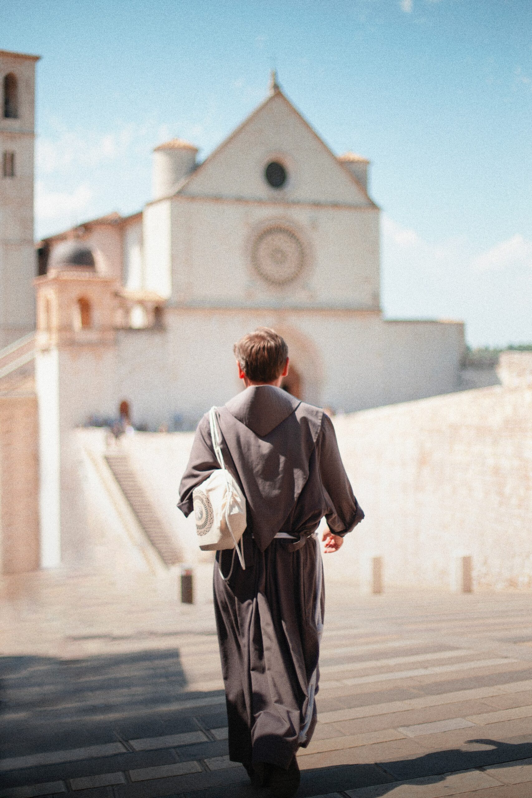 Religious man walking towards Church